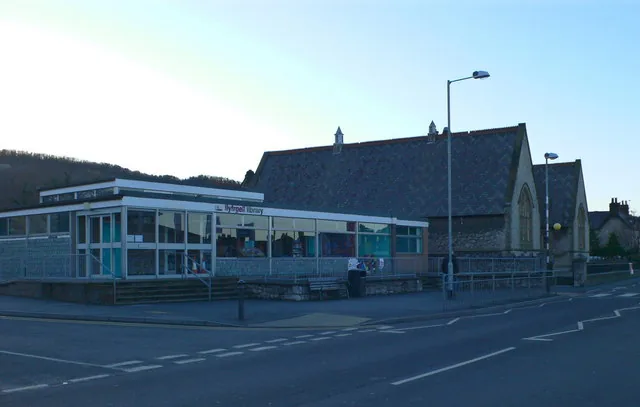 Abergele Library, a low civic building set back behind a paved forecourt