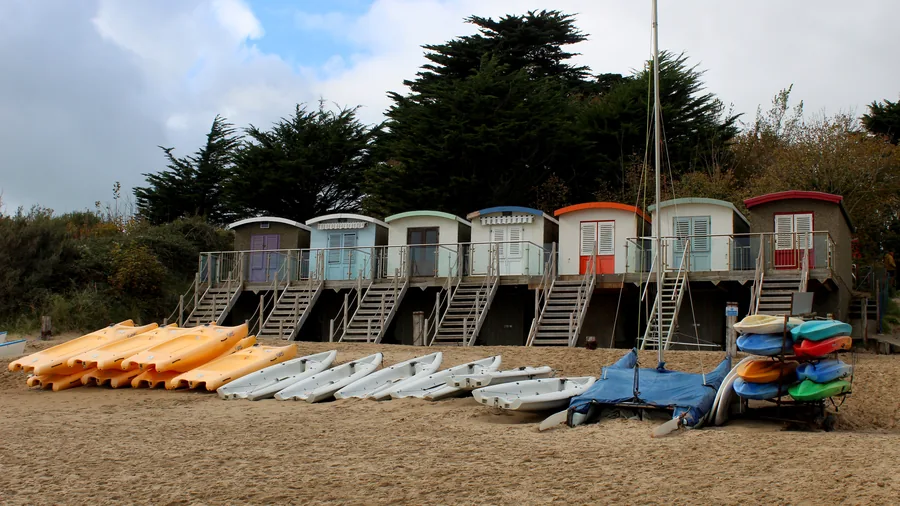 Boats moored off the beach at Abersoch, a sailing village on the Llŷn Peninsula, Gwynedd.