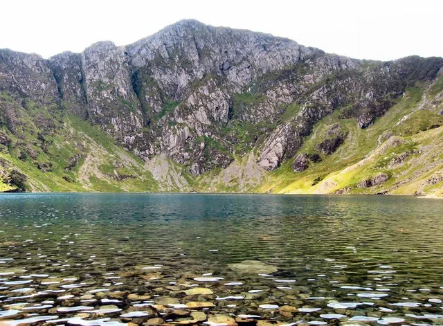 The rocky rim above Llyn Cau where the Minffordd Path gains the summit ridge of Cadair Idris