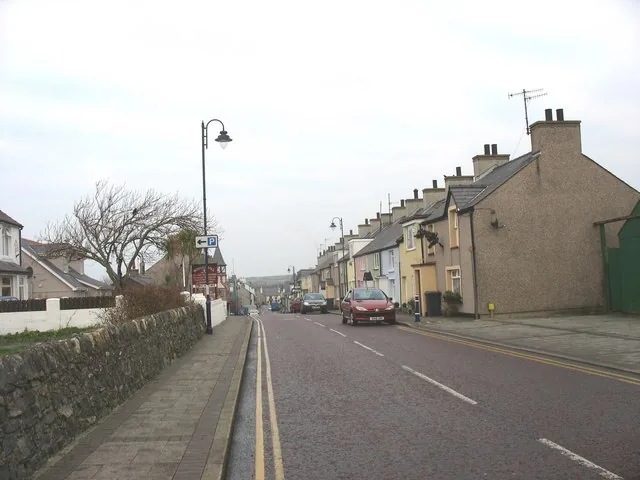 High Street, Cemaes, looking north between terraced houses towards the sea