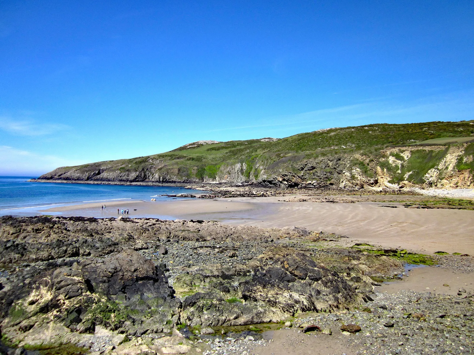 The sandy, cliff-backed beach at Church Bay on the north-west coast of Anglesey.