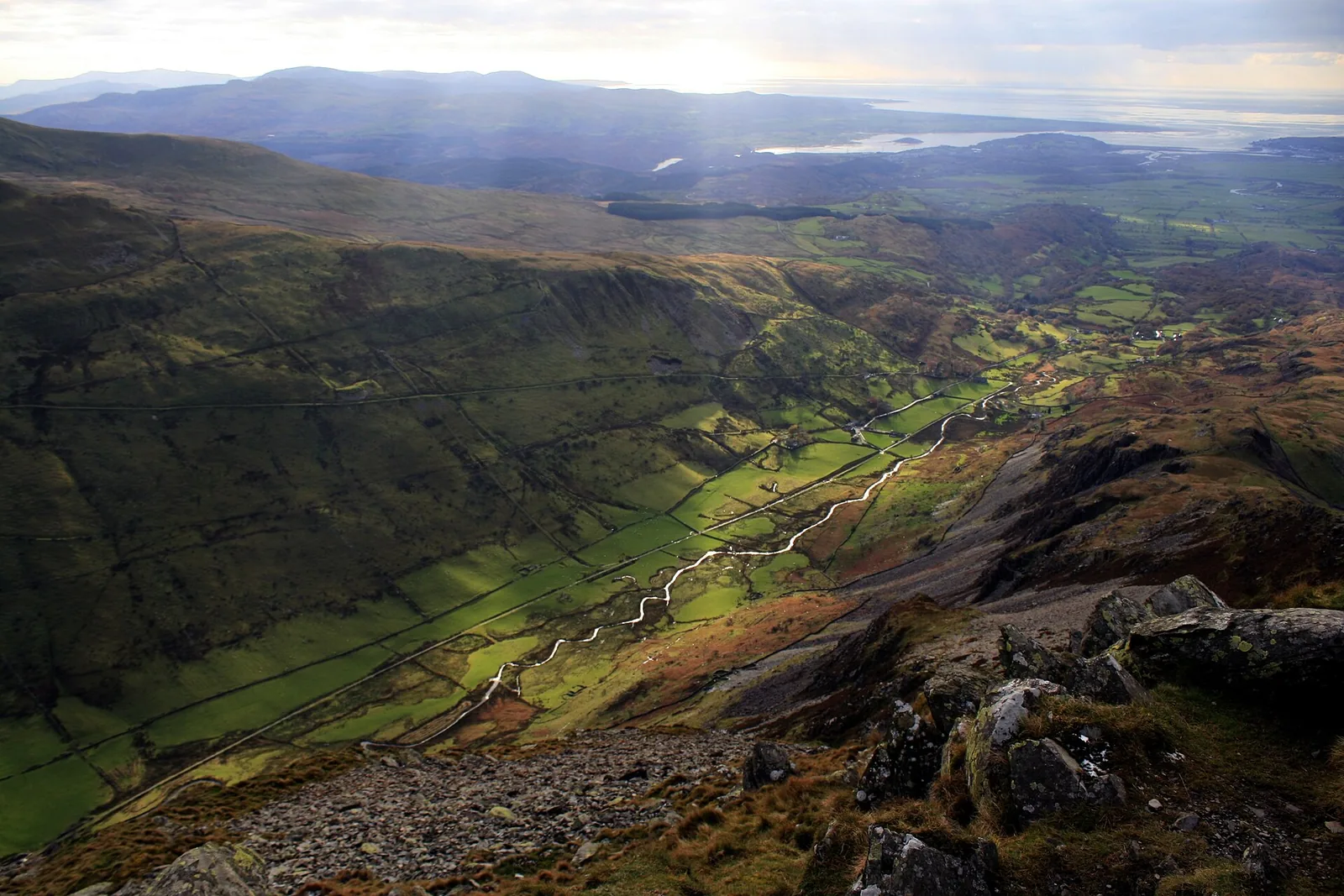 The view down Cwm Croesor from the summit of Cnicht, the valley falling away toward Tremadog Bay