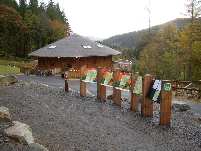 The Coed y Brenin Visitor Centre building among the trees, Gwynedd.