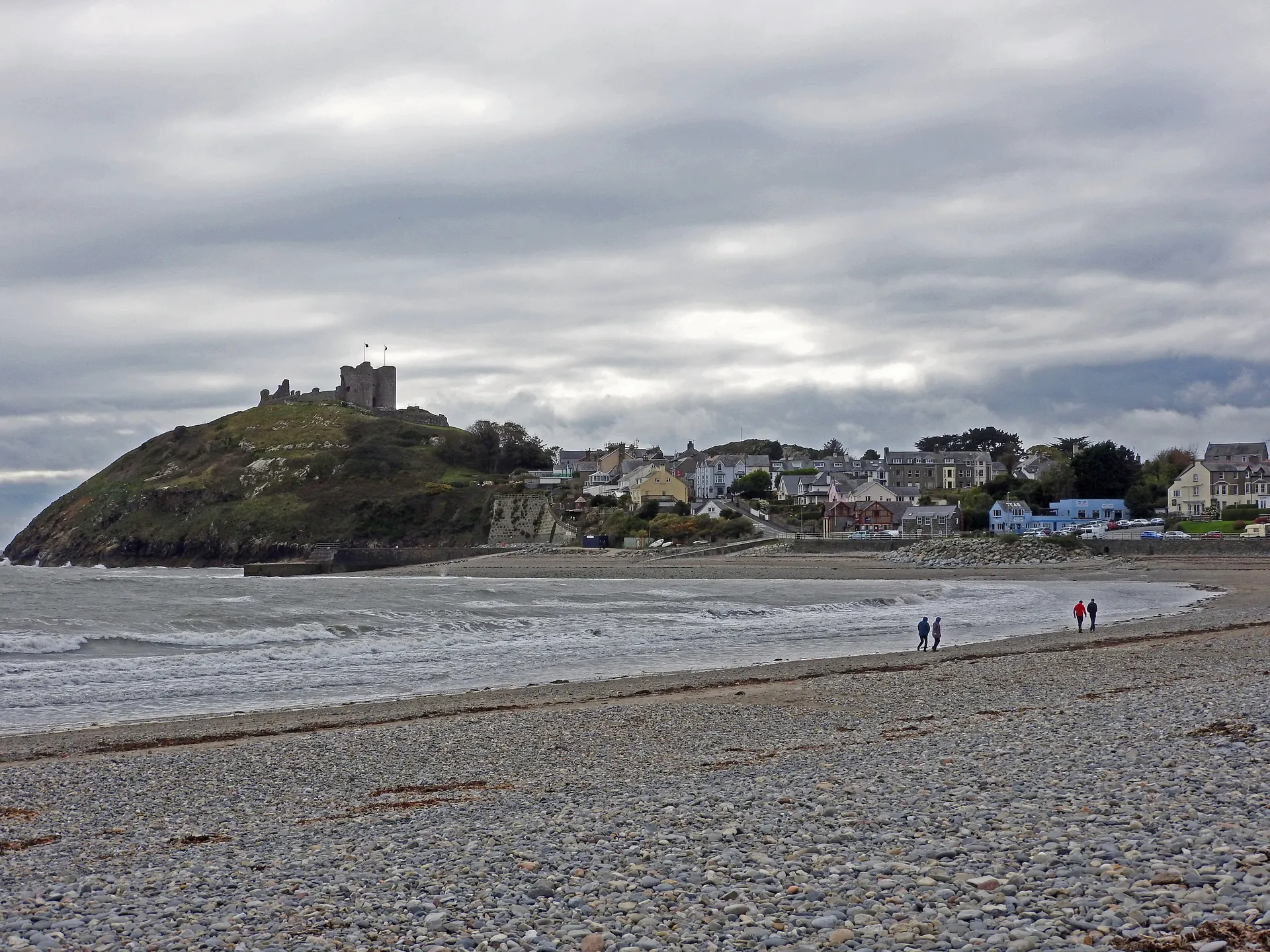Criccieth Castle on its headland promontory above the town, the bay and Tremadog Bay beyond.