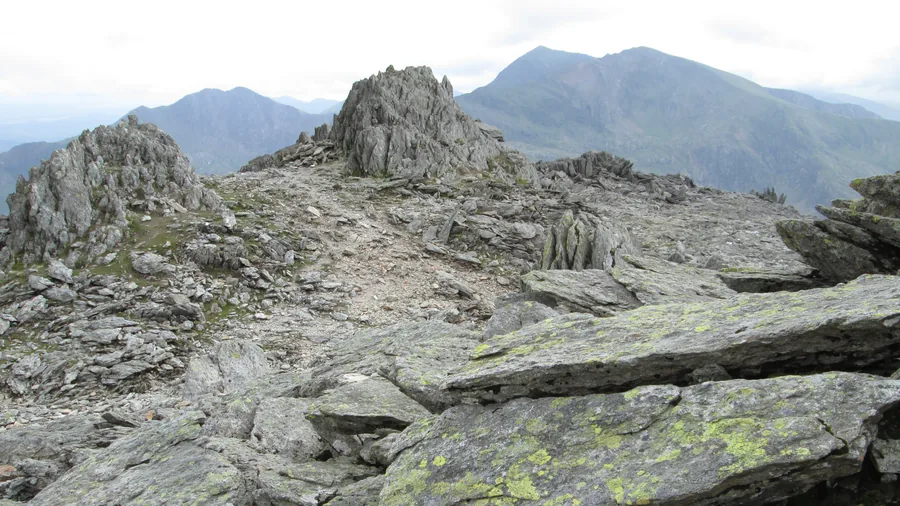The boulder-strewn summit plateau of Glyder Fawr in the Glyderau, Eryri, Gwynedd.