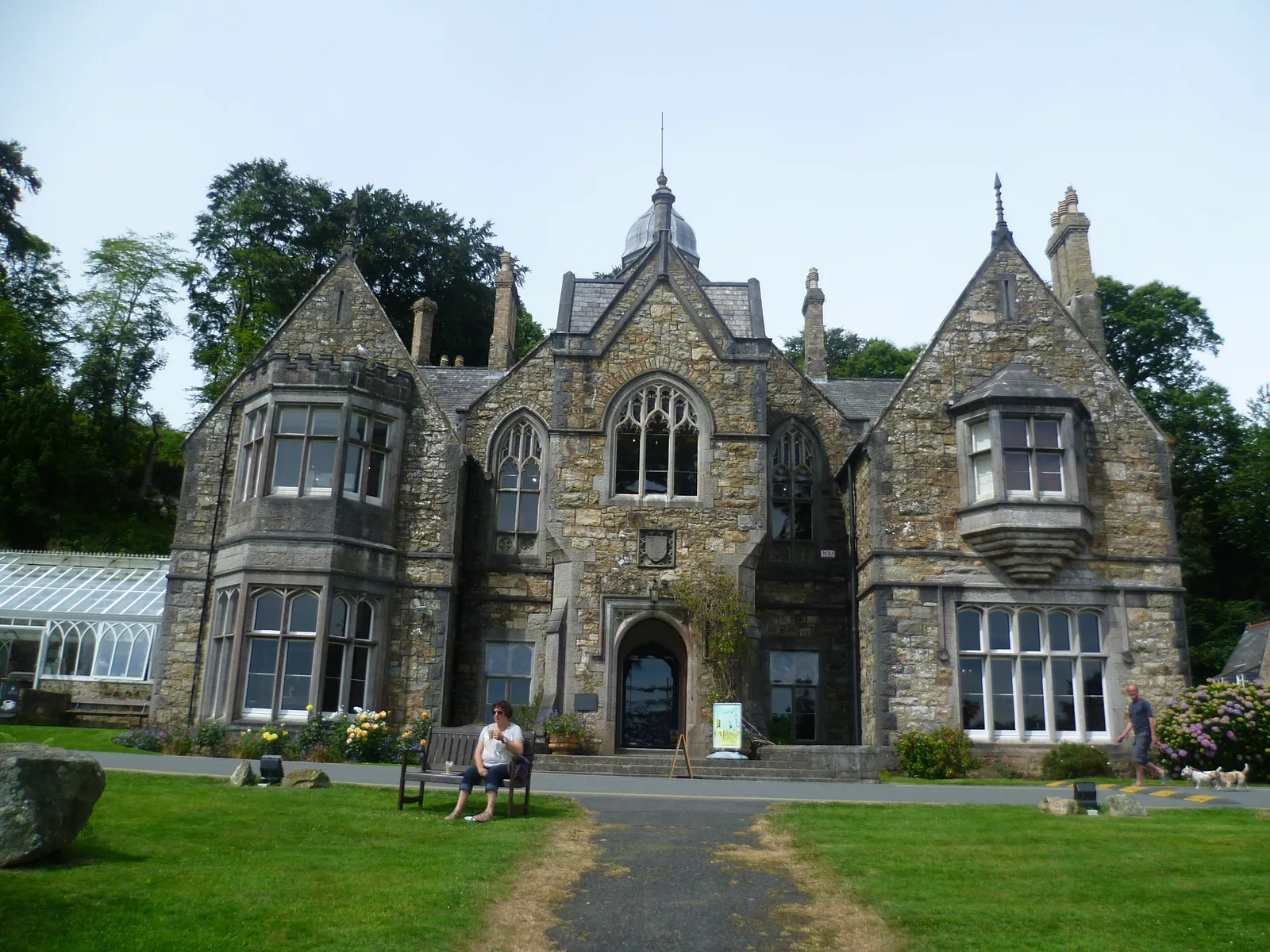 The Victorian Gothic front of Plas Glyn-y-Weddw seen across its lawn
