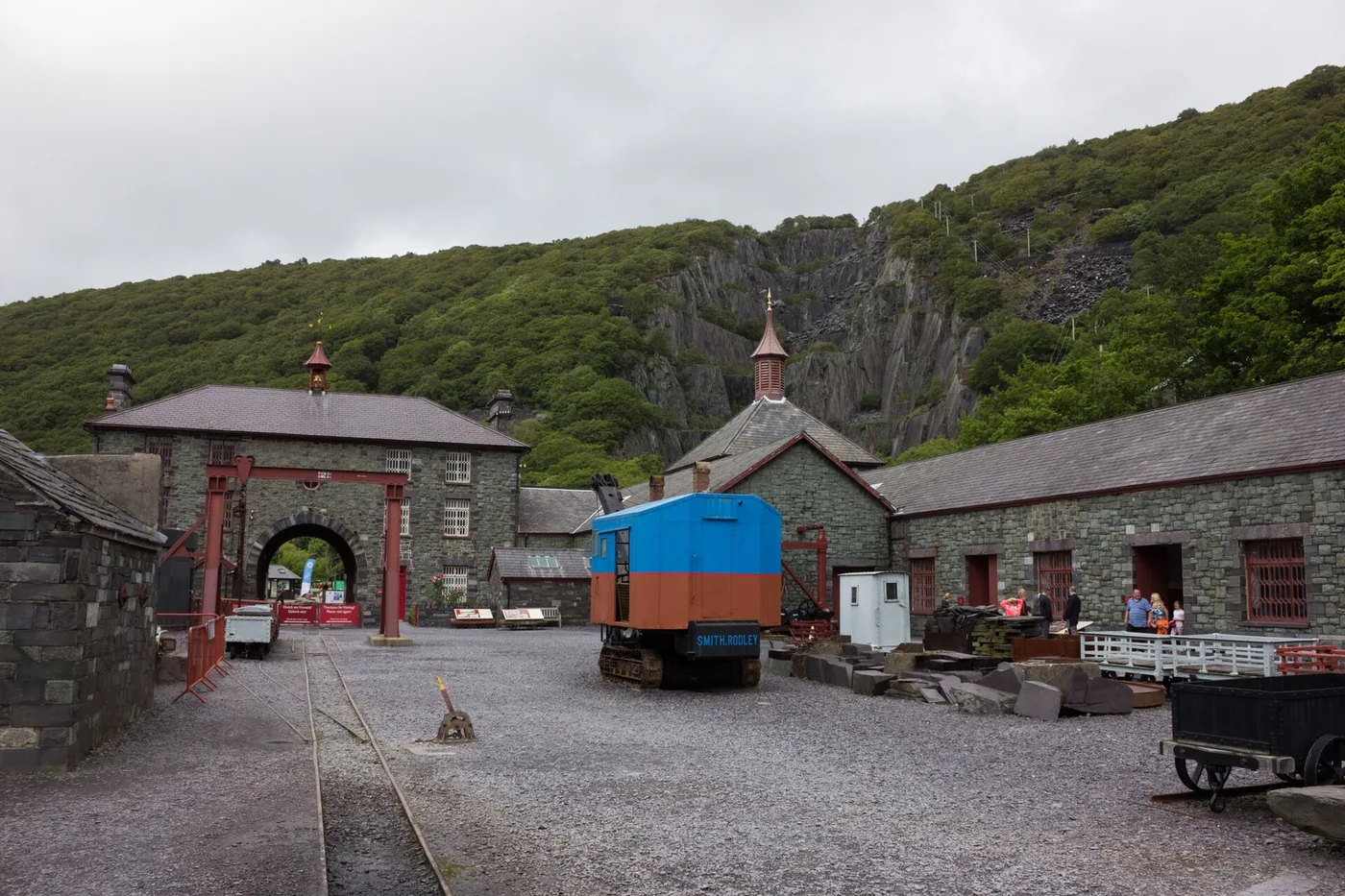 The National Slate Museum courtyard at Gilfach Ddu, with the Dinorwig quarry face behind