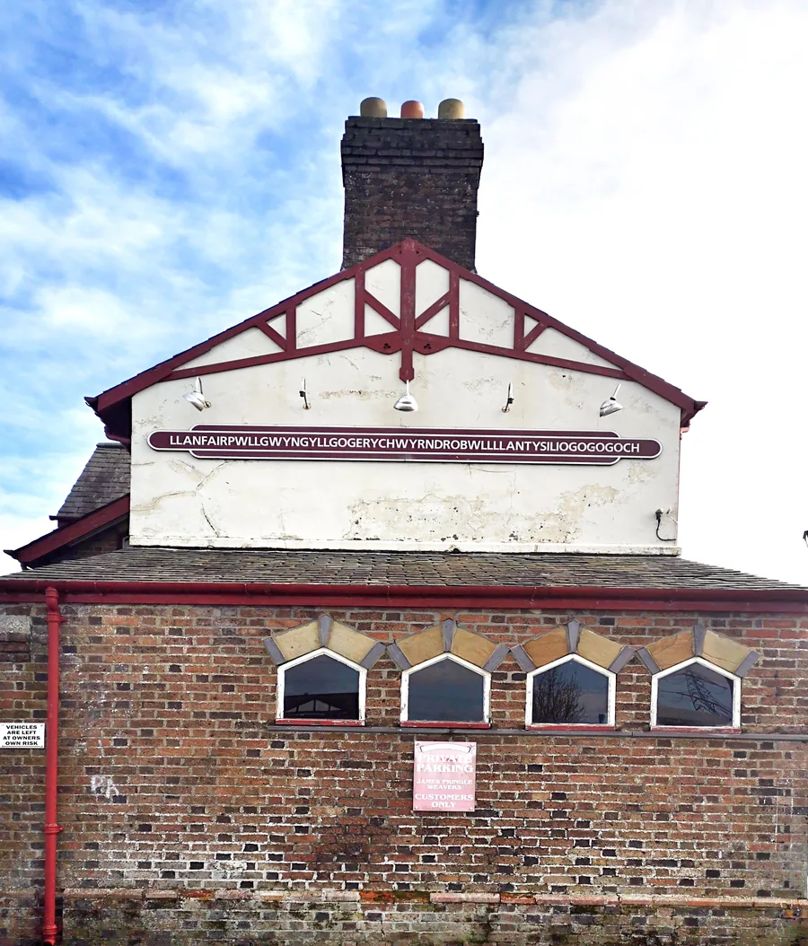 The full 58-letter station sign at Llanfairpwllgwyngyll railway station, Anglesey.