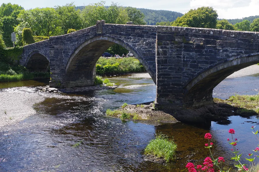 Pont Fawr, the three-arched stone bridge of 1636, crossing the River Conwy at Llanrwst.