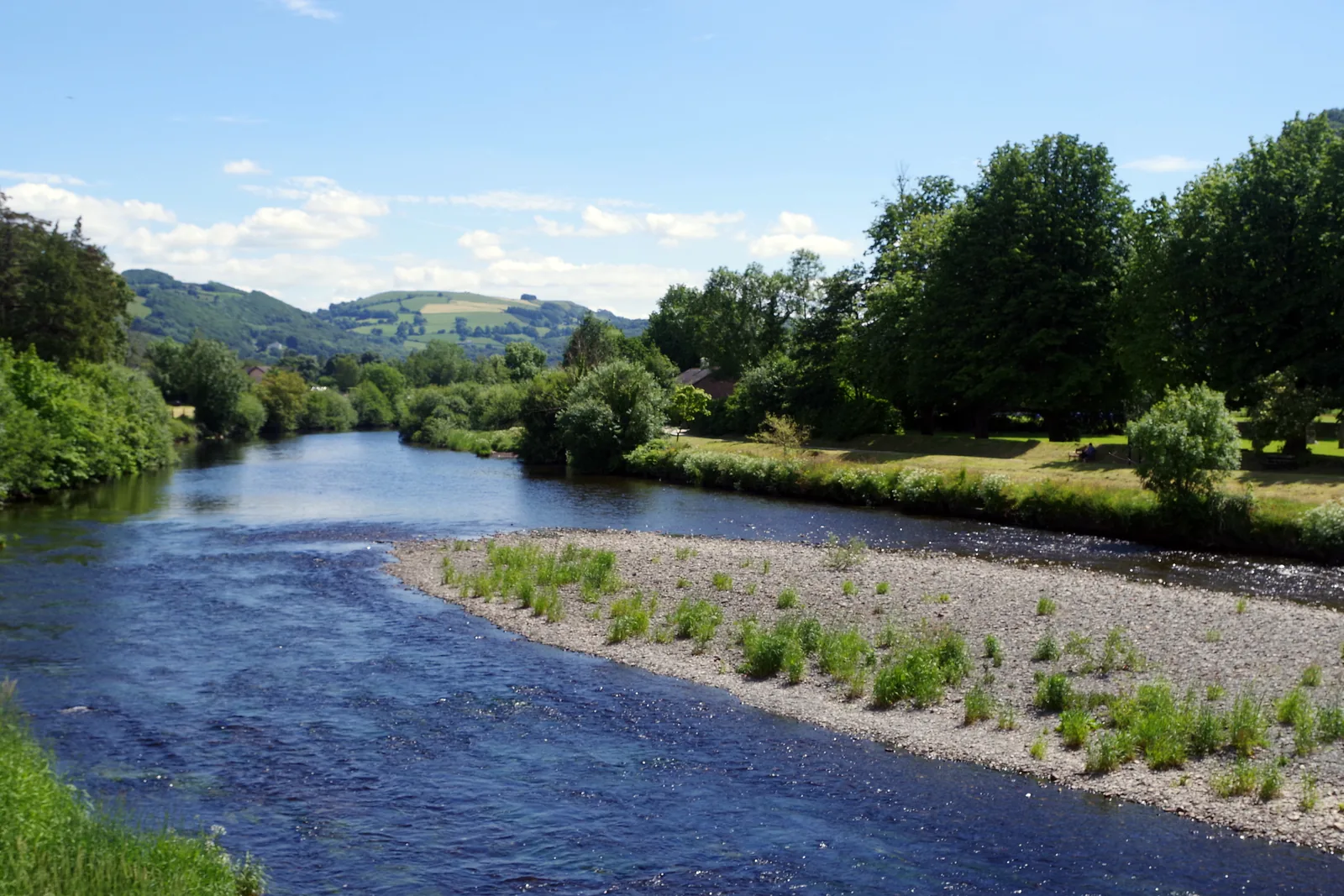 The River Conwy running past Llanrwst, wooded banks on either side