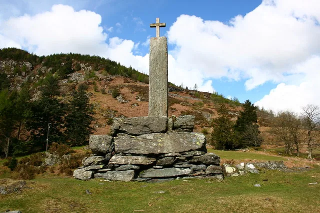 The Taliesin Monument on the hillside above Llyn Geirionydd.