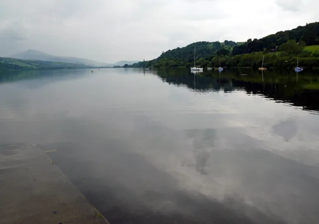 Llyn Tegid with an unusually calm, still, reflective water surface.