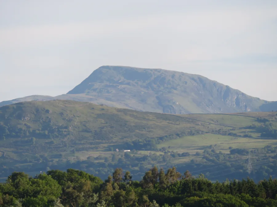 Pen Llithrig y Wrach's flat-topped profile rising above the valley in the Carneddau.