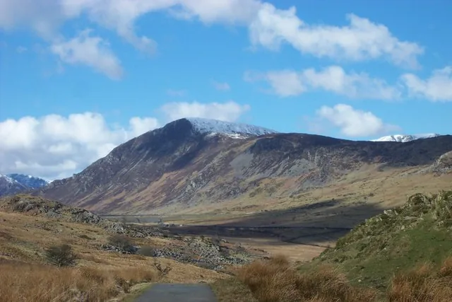 Pen Llithrig y Wrach under a dusting of snow, seen from the valley road
