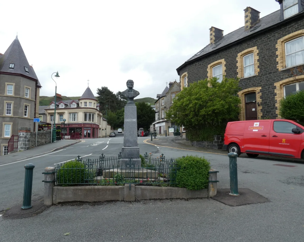 The Gladstone Memorial standing on its railed traffic island at the Penmaenmawr crossroads