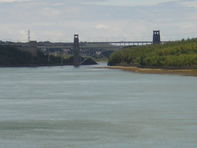 Pont Britannia — Britannia Bridge — seen across the Menai Strait from Plas Newydd's grounds.