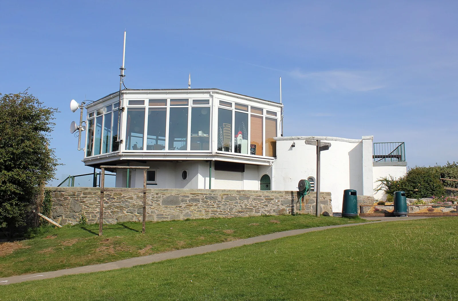 The Flagstaff Cafe at the Welsh Mountain Zoo, a glass-fronted building with a viewing terrace.