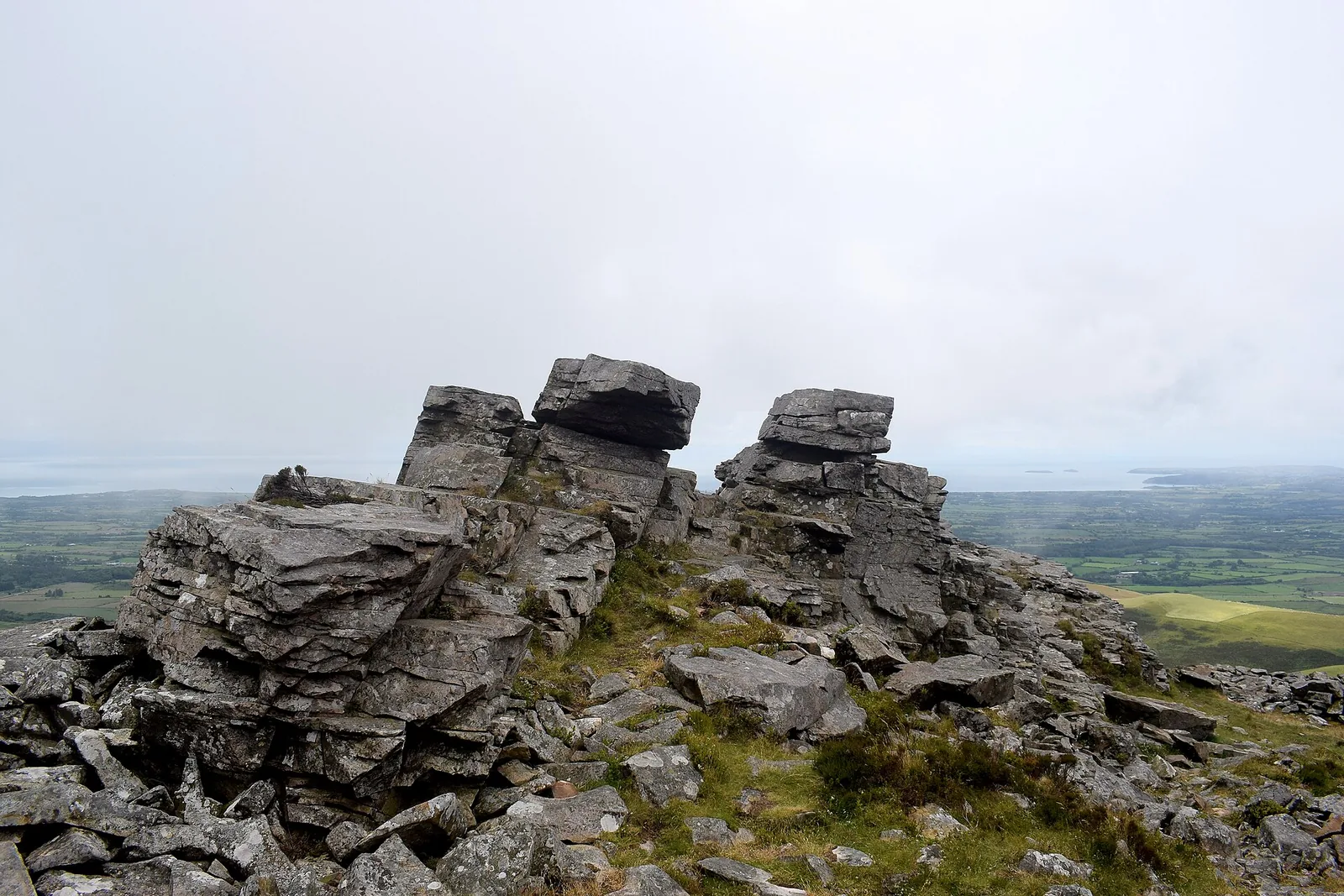 Rock tors on the eastern top of Yr Eifl above the Llŷn farmland